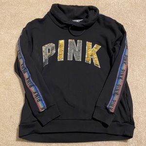 PINK funnel neck and rainbow sleeve.